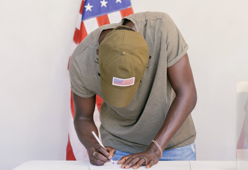 As fears about election security grow, military veterans are filling as poll workers