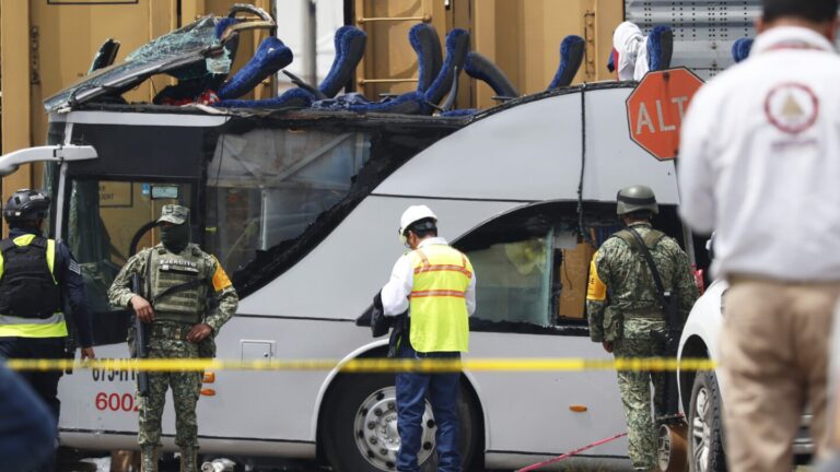 Train collision with bus in Mexico kills at least 10 people and injures dozens