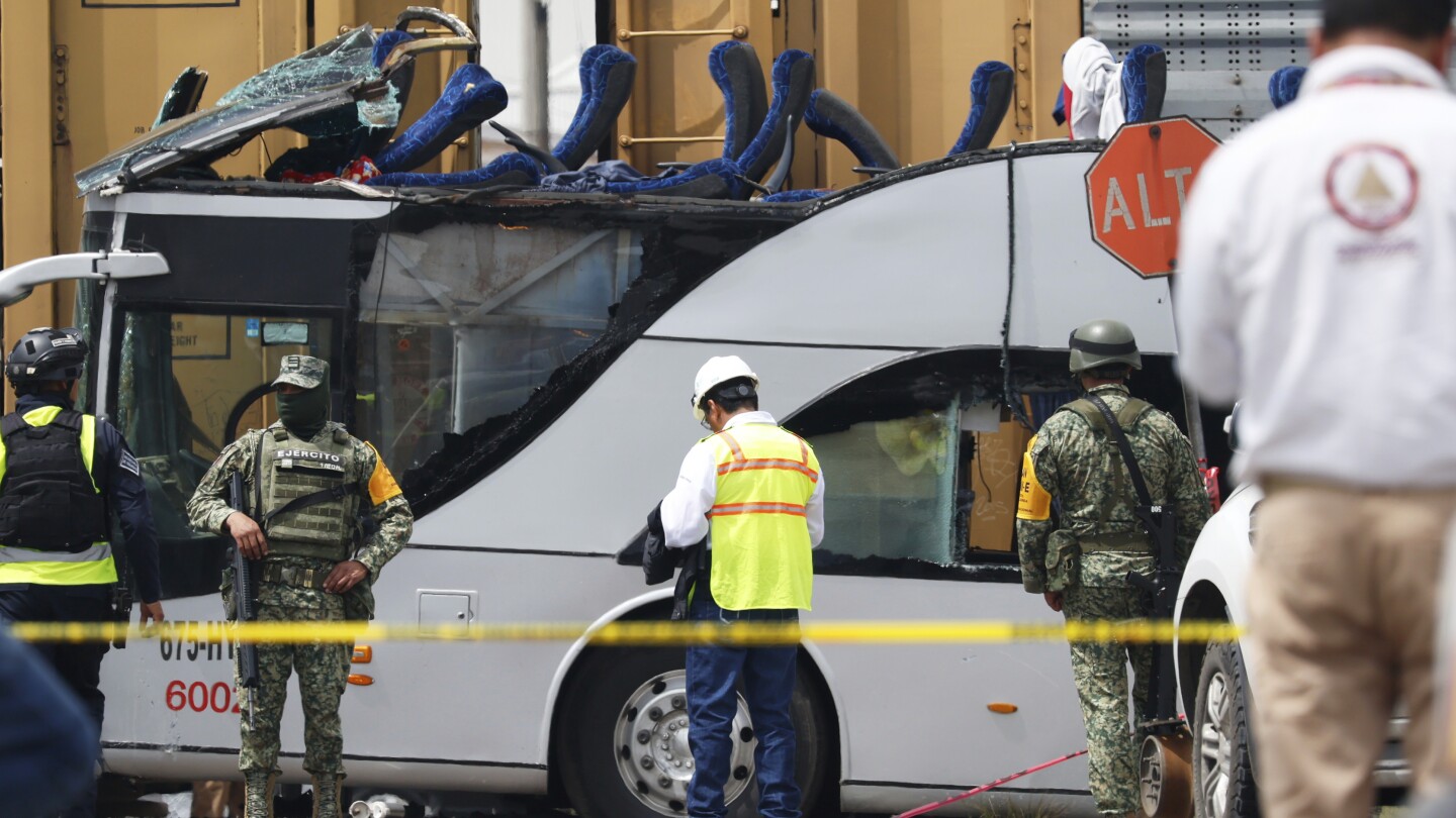 Train collision with bus in Mexico kills at least 10 people and injures dozens