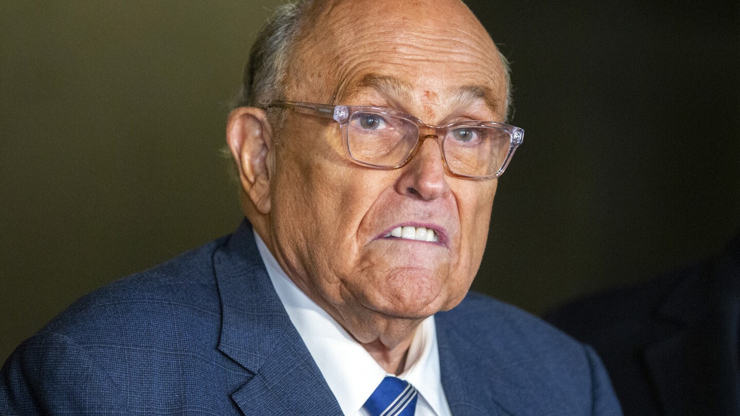 Rudy Giuliani and Dominion Voting Systems settle defamation suit over his 2020 election claims