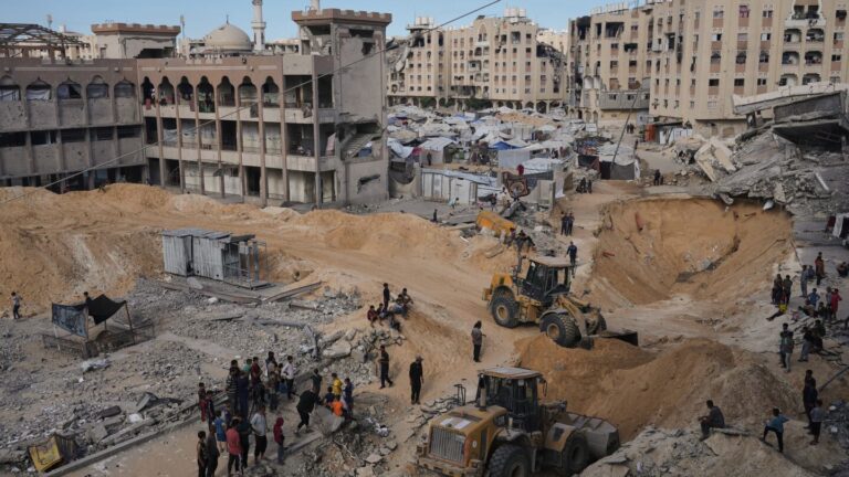 Israel says Hamas hands over '2 coffins of deceased hostages' from Gaza