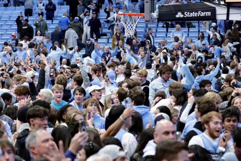 Duke's Scheyer says staff members 'got punched in the face' during court-storming; UNC AD apologizes