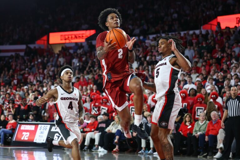 Alabama's Holloway had 2.1 pounds of pot when arrested, authorities say