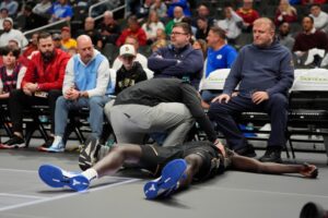 UCF's John Bol leaves game against Arizona after falling to court and clutching his chest
