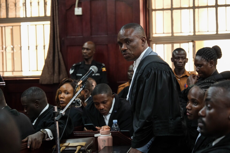 Ugandan opposition figure and rights lawyer charged with concealing treason