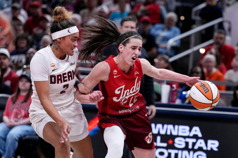 Caitlin Clark condemns 'harassment' as WNBA players face a surge of online threats