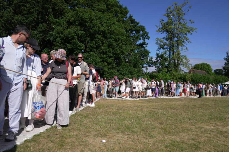 Fans wait hours in Wimbledon's famous queue for tickets
